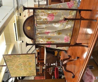 Lot 1146 - An Edwardian inlaid mahogany fire screen with floral curtain and a Georgian mahogany pole...