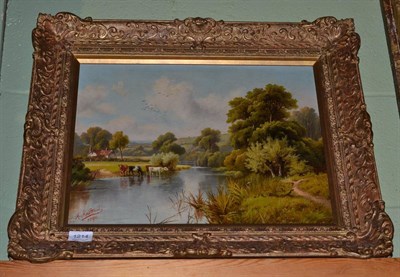 Lot 1214 - Oil on canvas, landscape with cows by water, by Henry Maidement, 1890