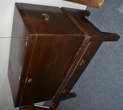 Lot 1233 - A George II mahogany chest on stand, mid 18th century, with hinged lid and brass solid...