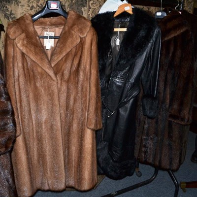 Lot 1236 - Walter Kerner musquash long coat, M Fletcher of Southport light brown mink coat, black leather coat