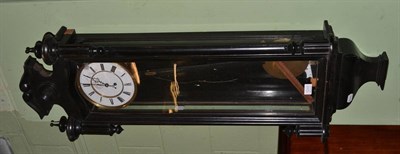 Lot 1245 - An ebonised Vienna type wall timepiece