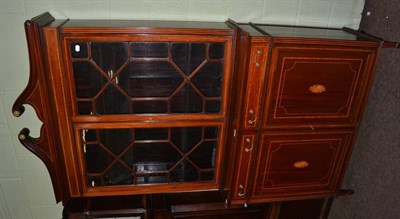 Lot 1248 - An Edwardian Sheraton Revival mahogany bookcase of small proportions