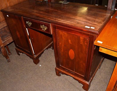 Lot 1267 - A Georgian style mahogany sideboard