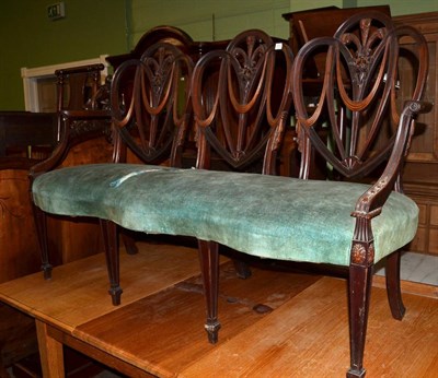 Lot 1270 - A Hepplewhite style three seater settee