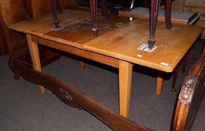 Lot 1271 - An Old Mill oak extending dining table, by the Knight family, the moulded rectangular top raised on