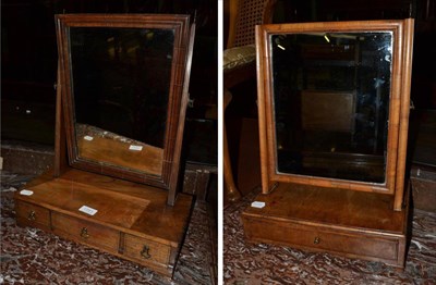 Lot 1281 - Two walnut veneered toilet mirrors