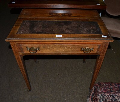 Lot 1300 - A Victorian rosewood writing table with cantilever top