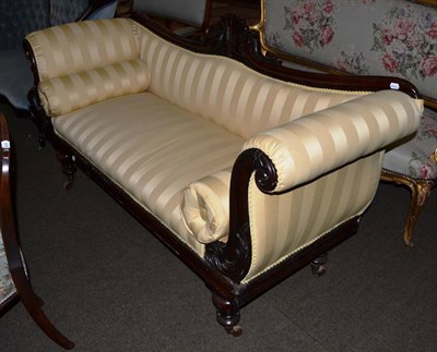 Lot 1311 - A Victorian rosewood framed settee upholstered in gold striped brocade