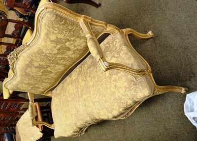 Lot 1328 - A French style cream and gilt framed settee