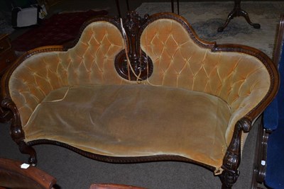 Lot 1333 - A Victorian walnut framed button back settee