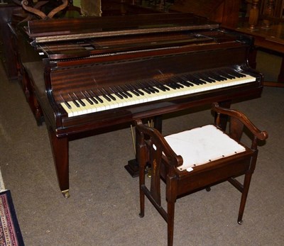 Lot 1343 - A Hopkinson mahogany baby grand piano (top lacks hinges) and a piano stool