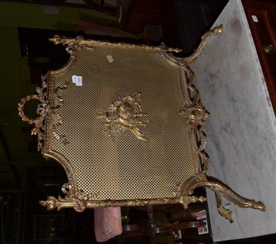 Lot 1344 - A regency style brass fire screen