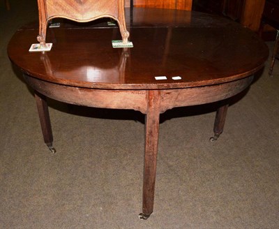 Lot 1360 - A mahogany drop leaf dining table