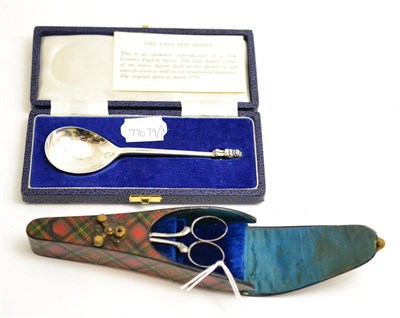 Lot 9 - Tartan ware scissor case and silver reproduction spoon in a fitted case (2)