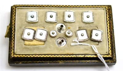 Lot 13 - A set of dress studs, mother-of-pearl body in decorative white frames, with a split pearl...