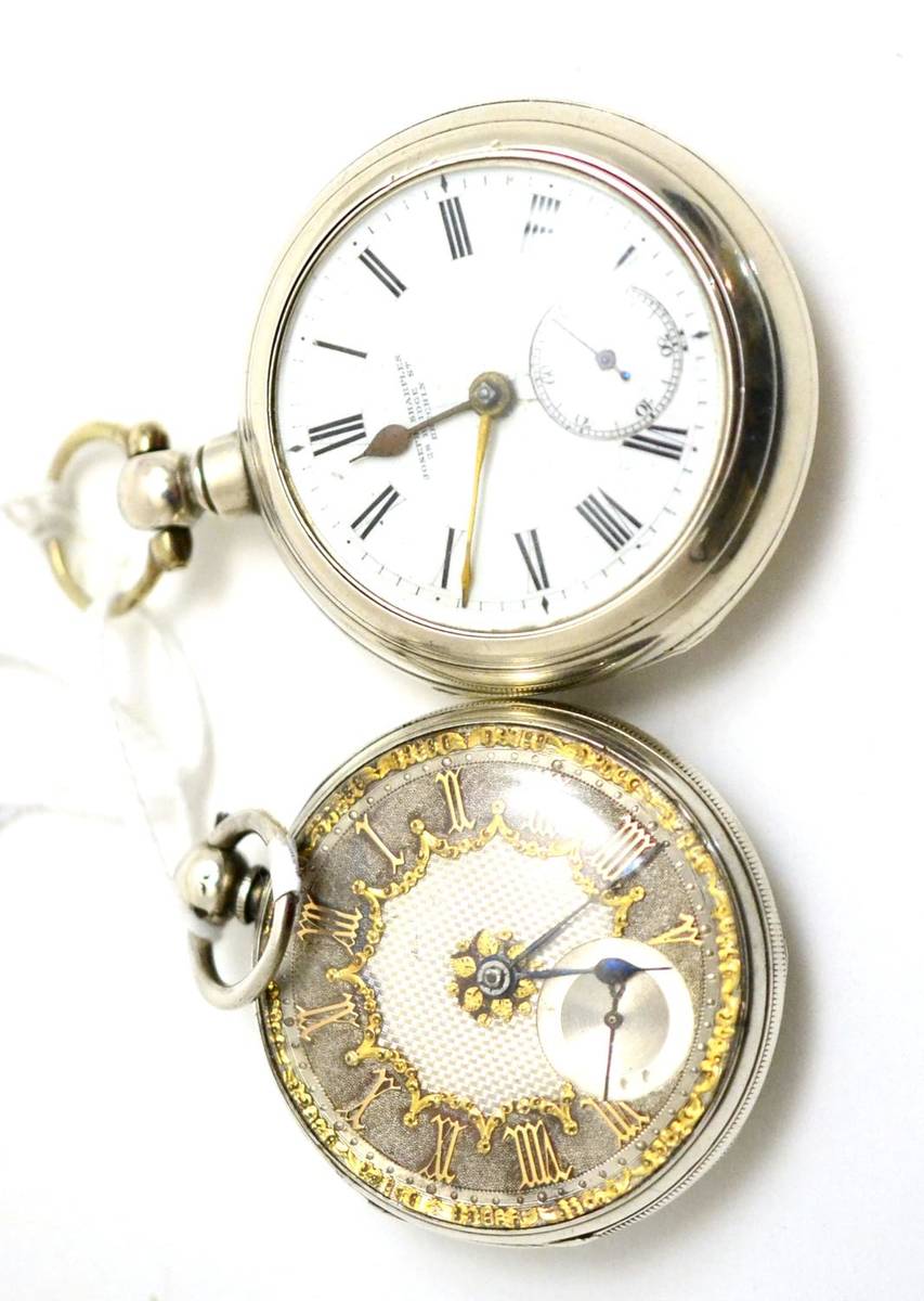 Lot 20 - A silver pair cased pocket watch, later outer case and a silver open faced pocket watch (2)