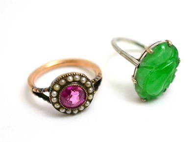 Lot 24 - A pink stone and seed pearl ring and a jadeite ring (3)