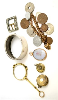 Lot 36 - A silver hinged bangle, a paste set buckle, three locket pendants, a coin bracelet and a pair...