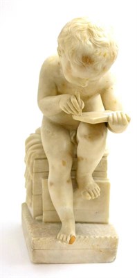 Lot 60 - An alabaster figure of a seated child writing on a tablet