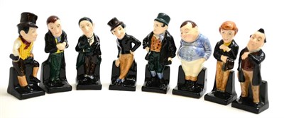 Lot 61 - Collection of eight Royal Doulton pottery Dickens figures