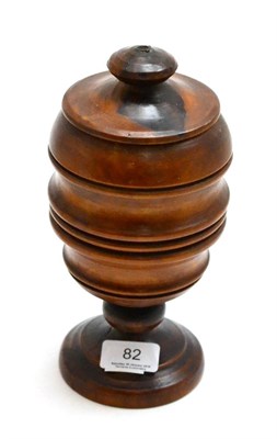 Lot 82 - A 19th century treen cup and cover