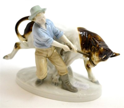 Lot 88 - A Continental porcelain figure group of a boy and cow