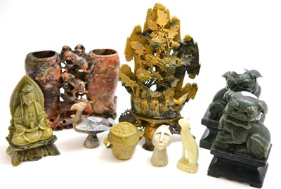 Lot 94 - Two soapstone figural groups, a pair of jadeite dogs, a soapstone figure of a deity, a...