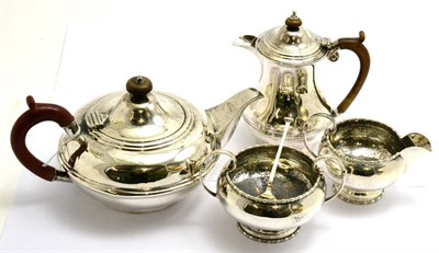 Lot 99 - A harlequin set of silver teapot, cream, hot water jug and sugar basin