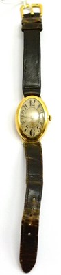 Lot 145 - A lady's oval shaped 18ct gold wristwatch