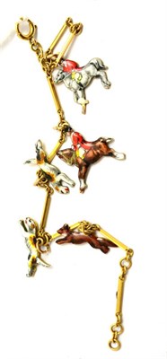 Lot 182 - A charm bracelet hung with five enamelled charms depicting a fox under pursuit by two hounds...