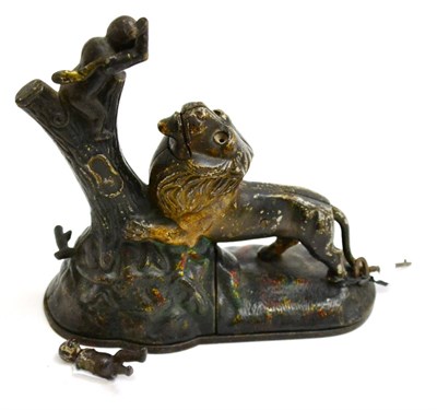 Lot 200 - Cast iron money bank in the form of a lion and monkey (overall G-F, paint worn, monkey lacks...