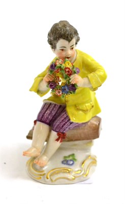 Lot 240 - A 20th century Meissen porcelain figure of a young boy