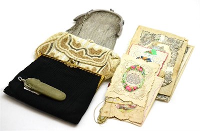 Lot 243 - A beaded purse, silver purse and a collection of Victorian cards