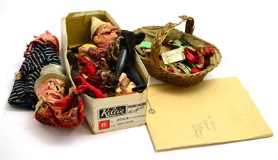 Lot 250 - Papier mache Punch and Judy and a basket of 'peddlars' items