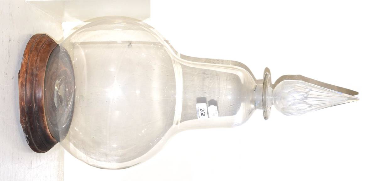 Lot 256 A large glass carboy with stopper and stand