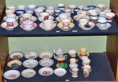 Lot 281 - Two shelves of English ceramic teacups, tea bowls, saucers, etc
