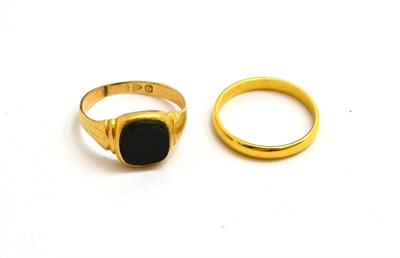 Lot 299 - An 18ct gold stone set signet ring (a.f.) and a 22ct band ring (2)