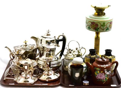 Lot 325 - Two trays including an oil lamp, YiXing teapot, silver plate, horn beaker, etc