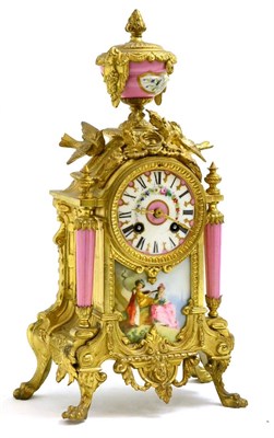 Lot 333 - A 19th century French gilt metal and porcelain mantel clock