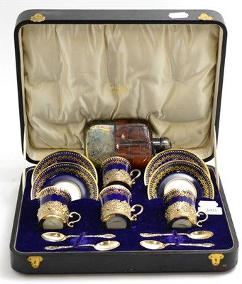 Lot 340 - A Walker & Hall silver mounted cobalt blue and gilt cased six piece Copeland china coffee set...