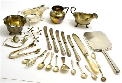 Lot 341 - A small collection of silver including two sauce boats, flatware, cream jug, etc