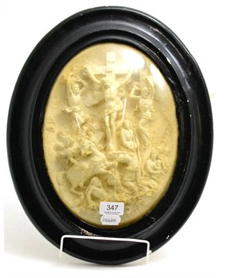 Lot 347 - A 19th century plaster high relief carving of Christ at Calvary