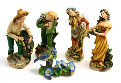 Lot 350 - A set of four Capodimonte figures of the four seasons and a bird figure