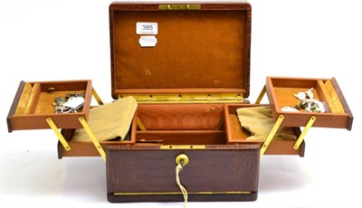 Lot 385 - A jewellery case and contents including a pair of blue stripe enamelled cufflinks, a single...