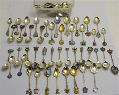 Lot 390 - A collection of silver and white metal souvenir spoons