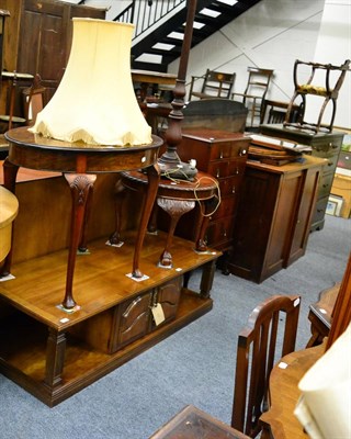 Lot 1072 - A chest of drawers, a standard lamp, an occasional table, an oval table and wall mirrors