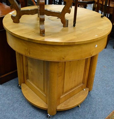 Lot 1075 - A bespoke Shortland oak kitchen island, 100cm diameter, 90cm high