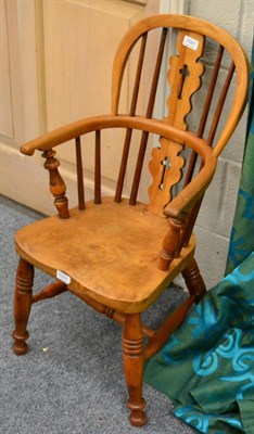 Lot 1091 - A child's yewwood Windsor chair