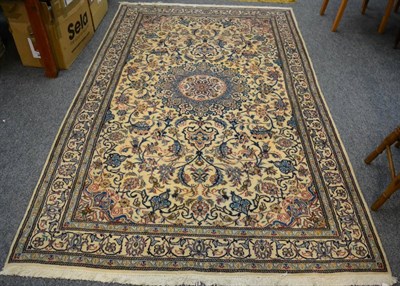 Lot 1094 - An Isfahan design rug, the ivory field with central medallion framed by spandrels and floral...