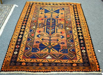 Lot 1095 - A Balouch rug, Persian/Afghan frontier, the field of tribal devices enclosed by narrow borders